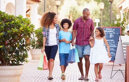 Happy Family Shopping together in the summer