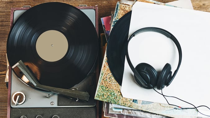 Vinyl Record Player, Headphones, and Cd's