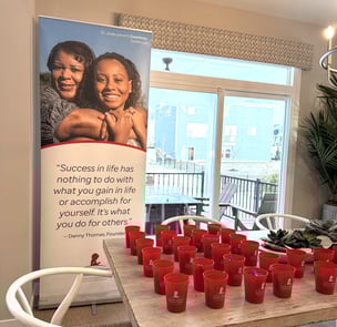 Photo of St. Jude banner in Fischer Homes Streets of Caledonia Model Home