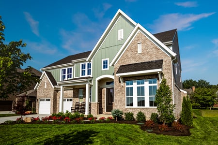 Fischer Homes Beckett Model. Light brick and green paneling, multi car garage. How to start home buying process? How to buy a home?