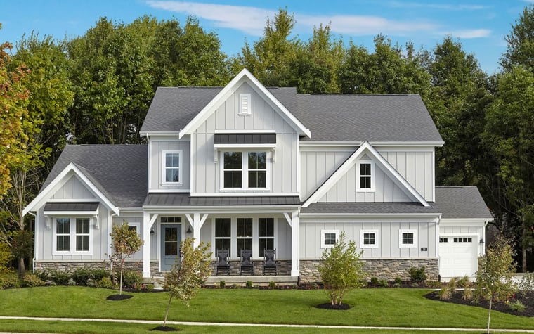 Leland Model Home at Chatham Brook at Chatham Hills modern farmhouse exterior with low stone siding