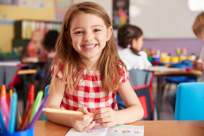 portrait-of-smiling-female-elementary-school-pupil-2022-02-02-05-09-44-utc (1)